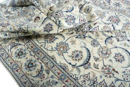 Surface texture of New Nain rug with natural Wool and intricate pattern