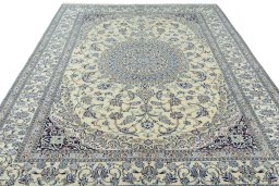 Surface texture of 2000s Nain rug with natural Wool and intricate pattern