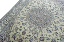 Backside of handmade 2000s Nain rug showing knot structure and weave density