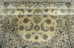 Close-up detail of 2000s Nain rug from Iran / Persia showing Wool weave