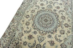 Backside of handmade 2000s Nain rug showing knot structure and weave density
