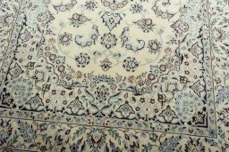 Close-up detail of 2000s Nain rug from Iran / Persia showing Wool weave