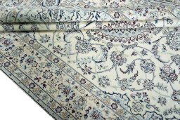 Close-up detail of 2000s Nain rug from Iran / Persia showing Wool weave