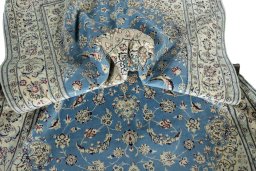 Surface texture of 2000s Nain rug with natural Cork and intricate pattern