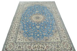 Surface texture of 2000s Nain rug with natural Cork and intricate pattern