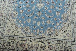 Close-up detail of 2000s Nain rug from Iran / Persia showing Cork weave
