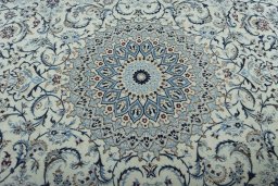 Central medallion detail of 2000s Nain rug from Iran / Persia
