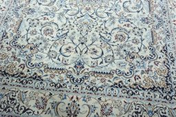 Close-up detail of 2000s Nain rug from Iran / Persia showing Wool weave