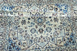 Close-up detail of 2000s Nain rug from Iran / Persia showing Wool weave