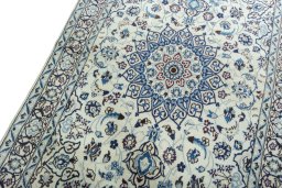 Backside of handmade 2000s Nain rug showing knot structure and weave density