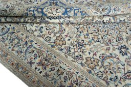 Close-up detail of 2000s Nain rug from Iran / Persia showing Wool weave