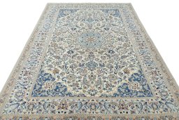 Surface texture of 2000s Nain rug with natural Wool and intricate pattern