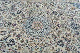 Central medallion detail of 2000s Nain rug from Iran / Persia