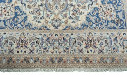 Full view of 2000s Nain rug from Iran / Persia, 287 × 190 cm in Beige tones