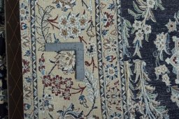 Close-up detail of New Nain rug from Iran / Persia showing Cork weave