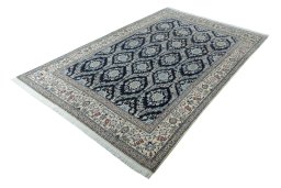 Corner detail of New Nain rug showing border pattern and Cork pile