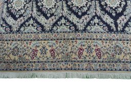 Central medallion detail of New Nain rug from Iran / Persia