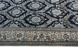 Close-up detail of New Nain rug from Iran / Persia showing Cork weave