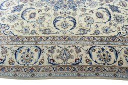 Corner detail of New Nain rug showing border pattern and Wool pile