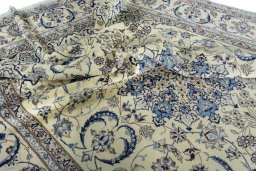 Surface texture of New Nain rug with natural Wool and intricate pattern