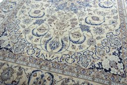 Close-up detail of New Nain rug from Iran / Persia showing Wool weave