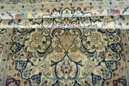 Close-up detail of 2000s Nain rug from Iran / Persia showing Wool weave