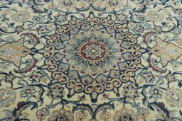 Central medallion detail of 2000s Nain rug from Iran / Persia