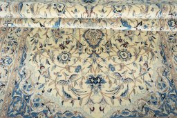 Close-up detail of 2000s Nain rug from Iran / Persia showing Wool weave