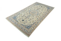 Corner detail of 2000s Nain rug showing border pattern and Wool pile