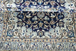 Close-up detail of 2000s Nain rug from Iran / Persia showing Wool weave
