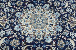 Central medallion detail of 2000s Nain rug from Iran / Persia