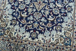 Close-up detail of 2000s Nain rug from Iran / Persia showing Wool weave
