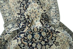 Close-up detail of 2000s Nain rug from Iran / Persia showing Wool weave