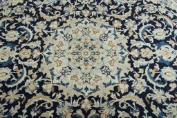 Central medallion detail of 2000s Nain rug from Iran / Persia