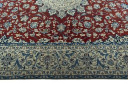 Corner detail of 2000s Nain rug showing border pattern and Wool pile
