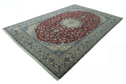 Corner detail of 2000s Nain rug showing border pattern and Wool pile