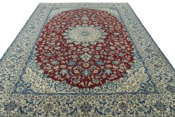 Surface texture of 2000s Nain rug with natural Wool and intricate pattern