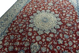 Backside of handmade 2000s Nain rug showing knot structure and weave density