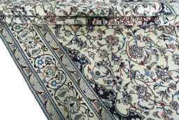 Close-up detail of 2000s Nain rug from Iran / Persia showing Wool weave