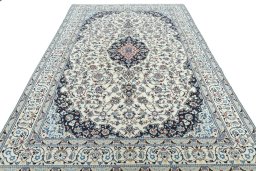 Surface texture of 2000s Nain rug with natural Wool and intricate pattern