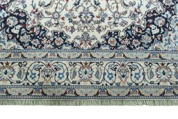 Full view of 2000s Nain rug from Iran / Persia, 345 × 215 cm in Beige tones