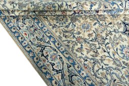 Close-up detail of 2000s Nain rug from Iran / Persia showing Wool weave