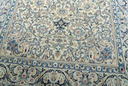 Close-up detail of 2000s Nain rug from Iran / Persia showing Wool weave