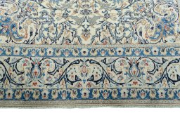 Full view of 2000s Nain rug from Iran / Persia, 323 × 196 cm in Beige tones