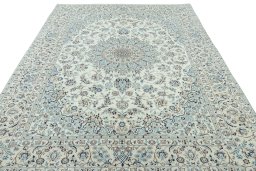 Surface texture of 2000s Nain rug with natural Wool and intricate pattern