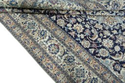 Close-up detail of 2000s Nain rug from Iran / Persia showing Wool weave