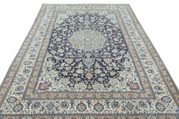 Surface texture of 2000s Nain rug with natural Wool and intricate pattern