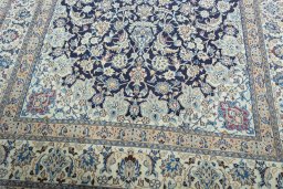 Close-up detail of 2000s Nain rug from Iran / Persia showing Wool weave