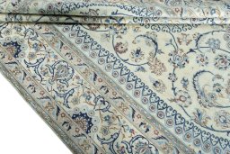 Close-up detail of 2000s Nain rug from Iran / Persia showing Wool weave