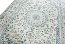 Backside of handmade 2000s Nain rug showing knot structure and weave density